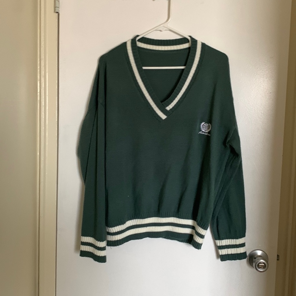 Dark green v neck with white stripes